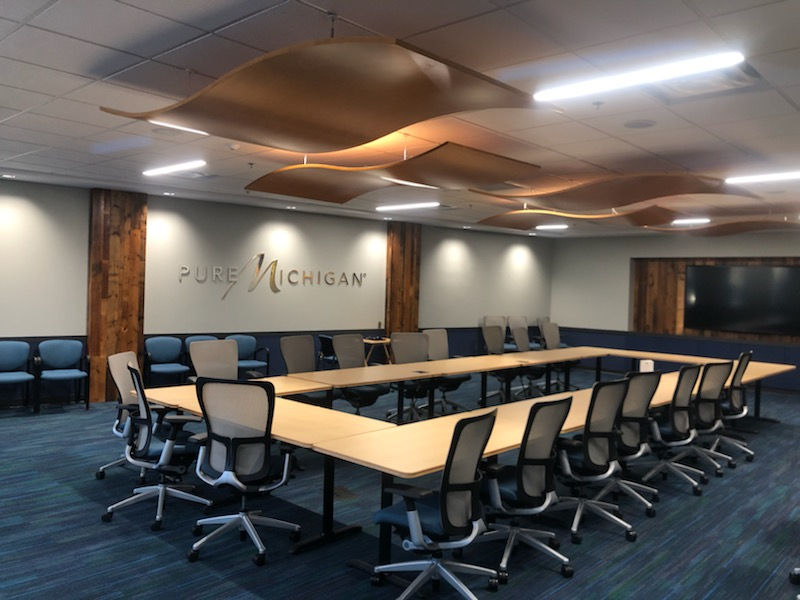 Conference room with sculptural wood ceiling panels